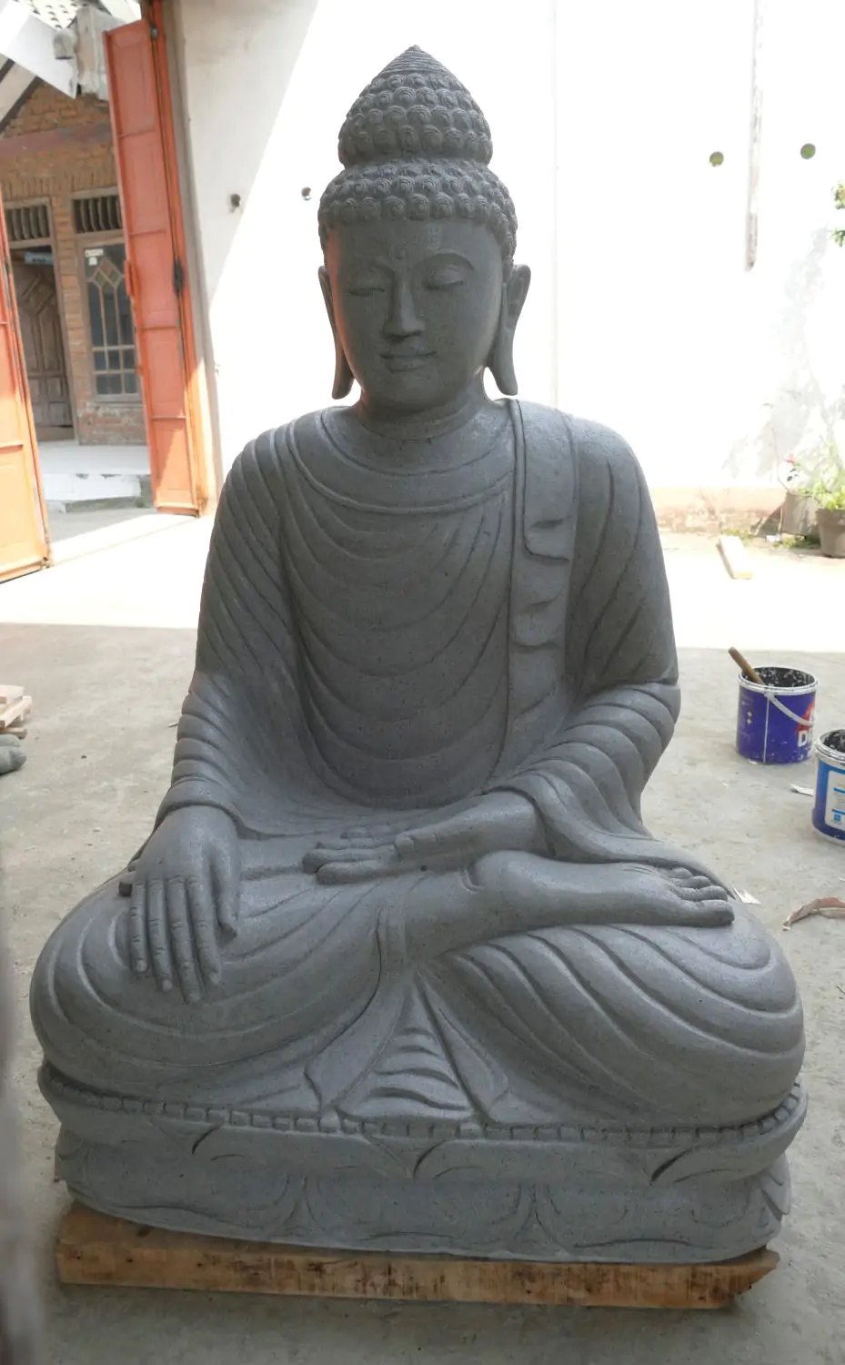  Product image 2 of the product “Seated Buddha made of Riverstone in Bhumisparsha - gesture of touching the earth. 122,5 cm height. ”